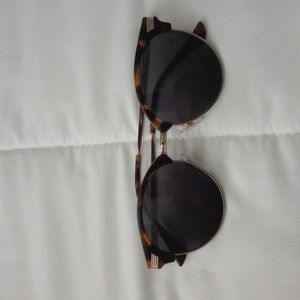 Sunglasses case included